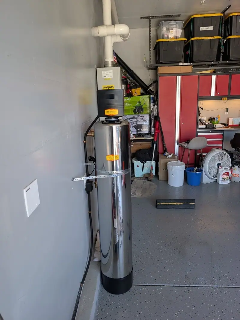 Whole-home water treatment tank