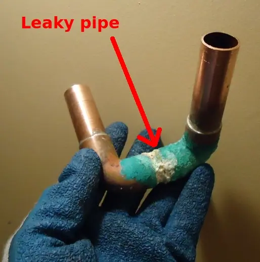 Corroded copper pipe fitting from acidic (low pH) water