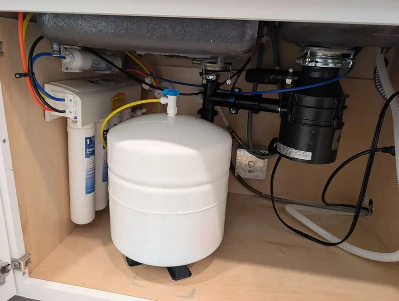Under-sink reverse osmosis (RO) system installed by Liquid Solutions Inc
